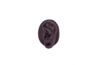 human ear with gauge