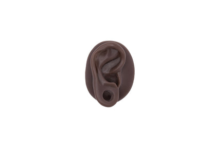 human ear with gauge