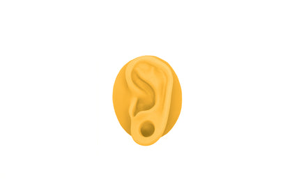 human ear with gauge