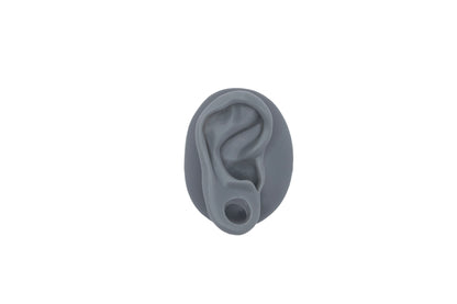 human ear with gauge